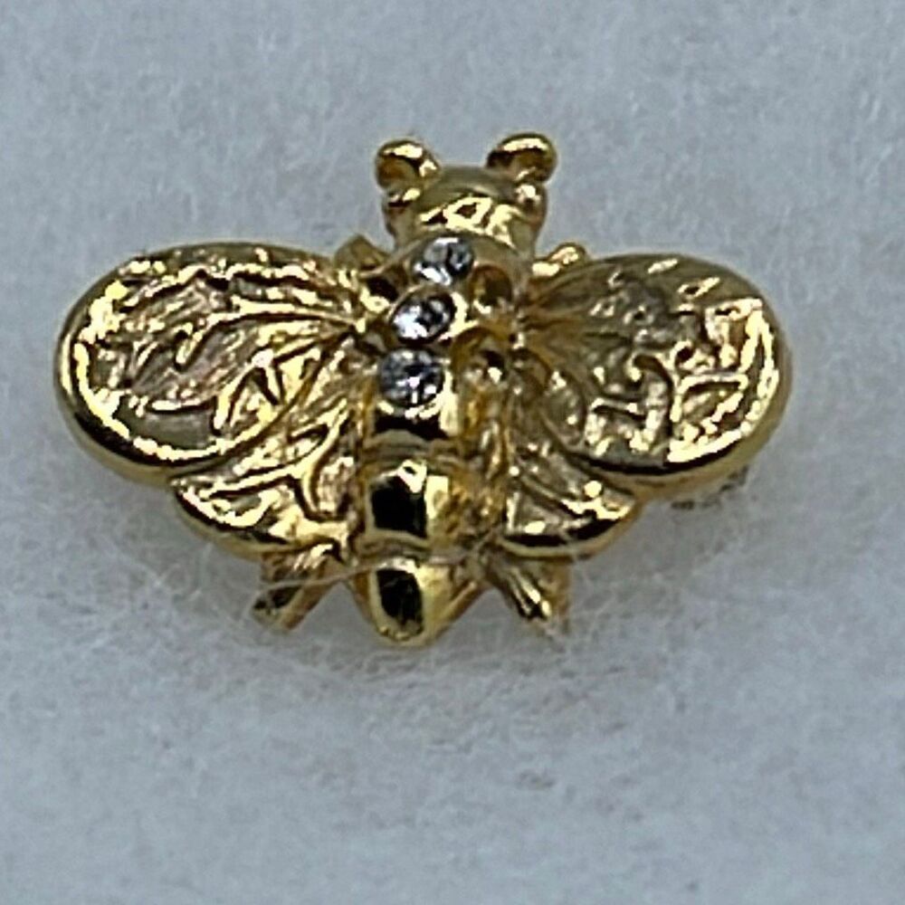 Vintage small gold tone rhinestone bumblebee pin.